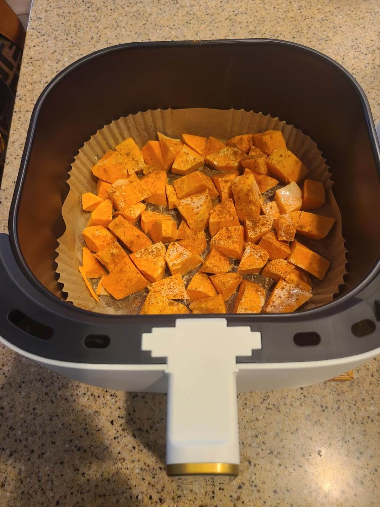 diced-sweet-potatoes-in-paris-hilton-air-fryer